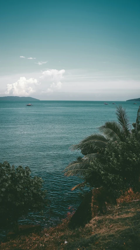 a boat sailing across a large body of water