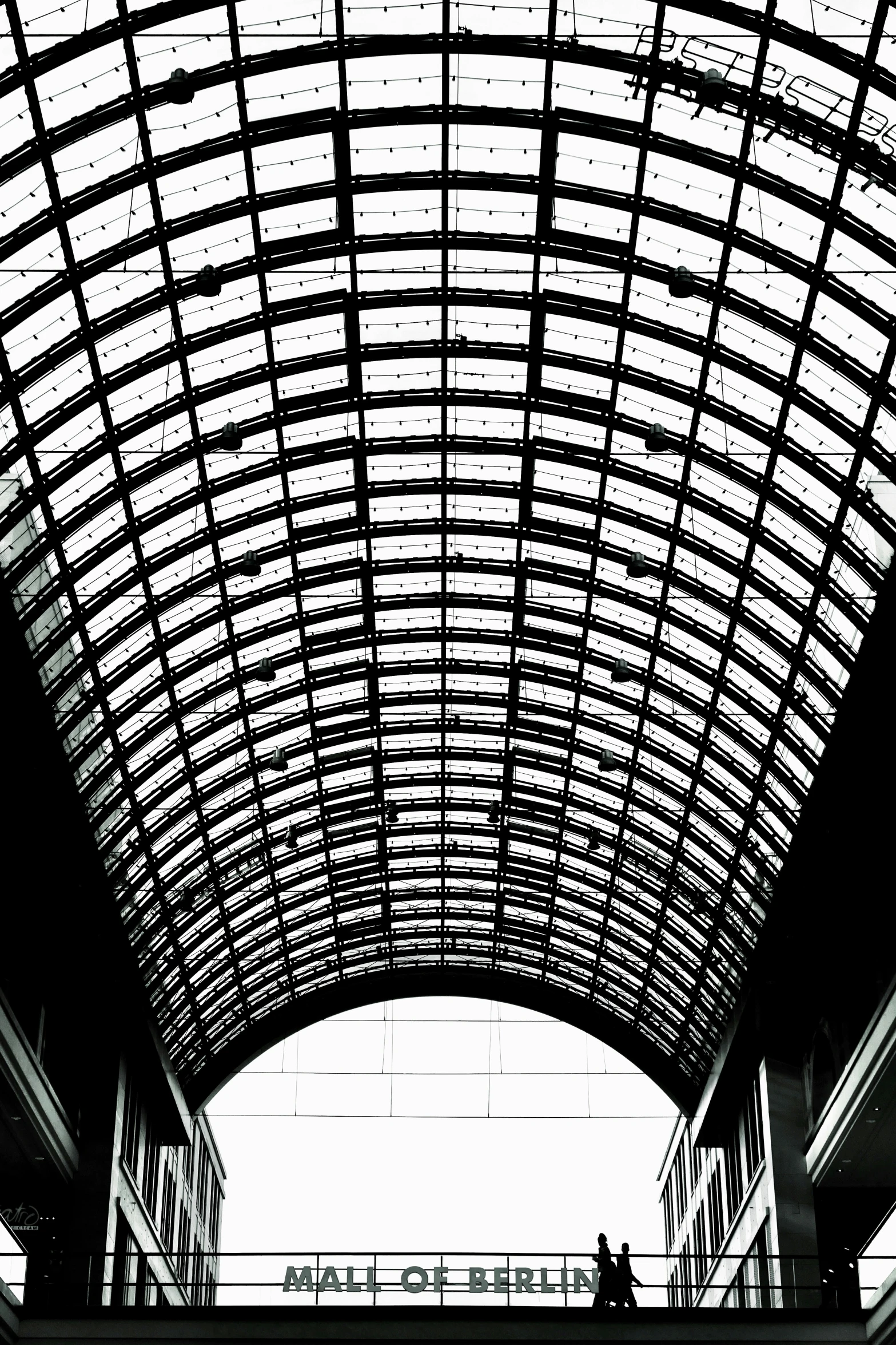 black and white image of a subway station