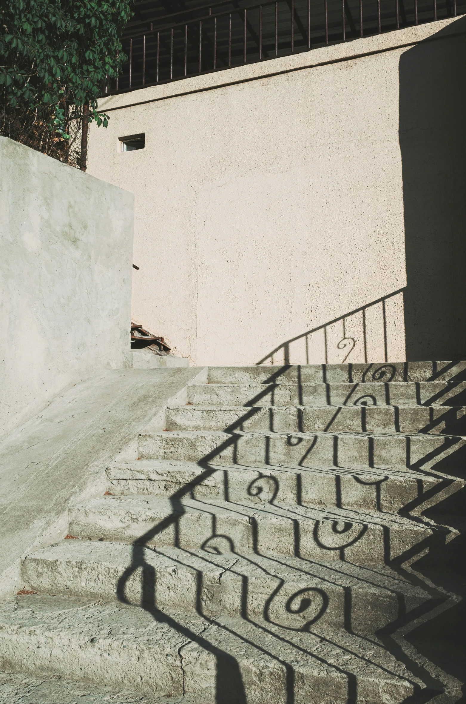 a skateboarder is riding down some concrete stairs