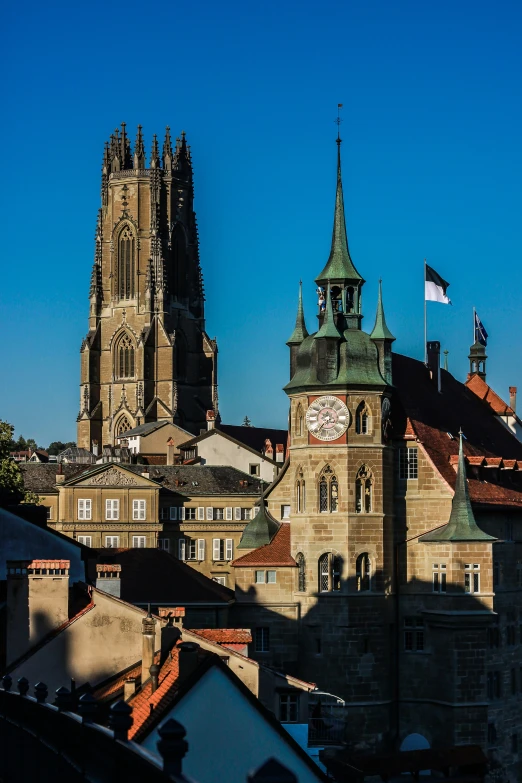 a city with a cathedral and a clock tower