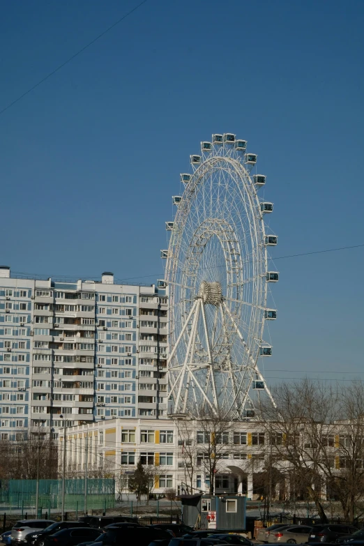 a ferris wheel in the middle of a lot