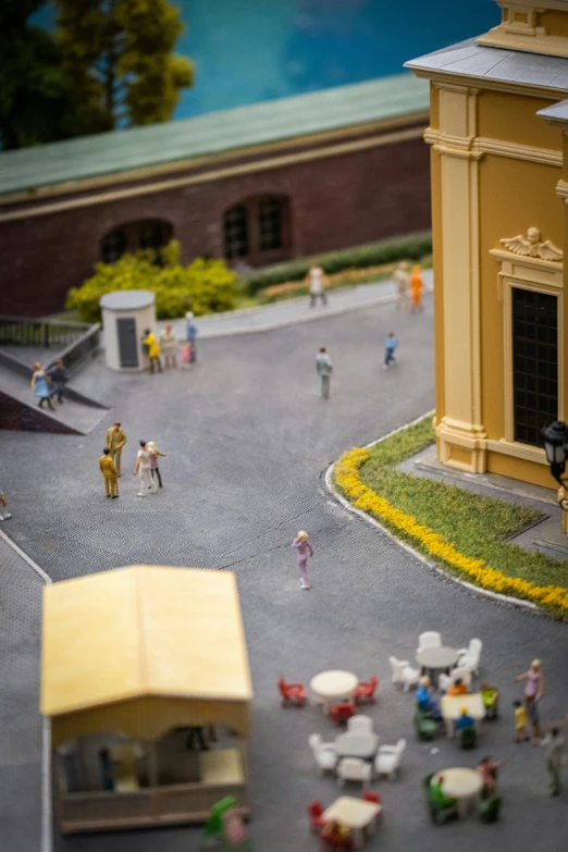 a small model of people playing on a street