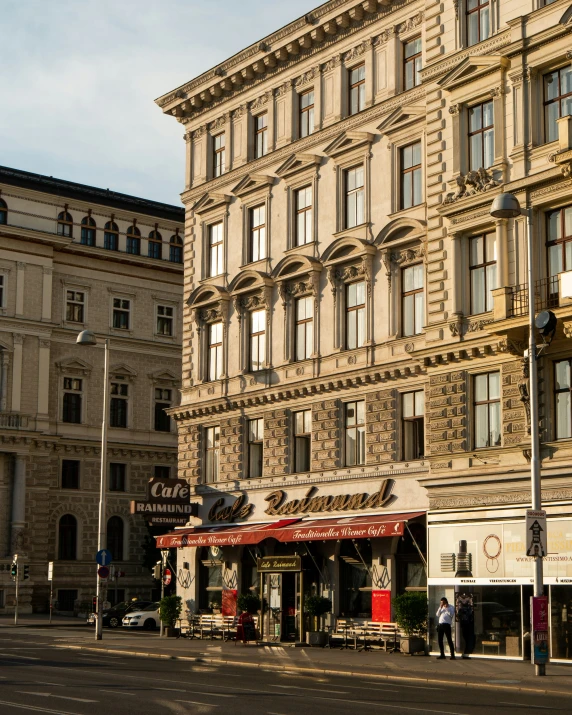 buildings in the city near an intersection on a sunny day