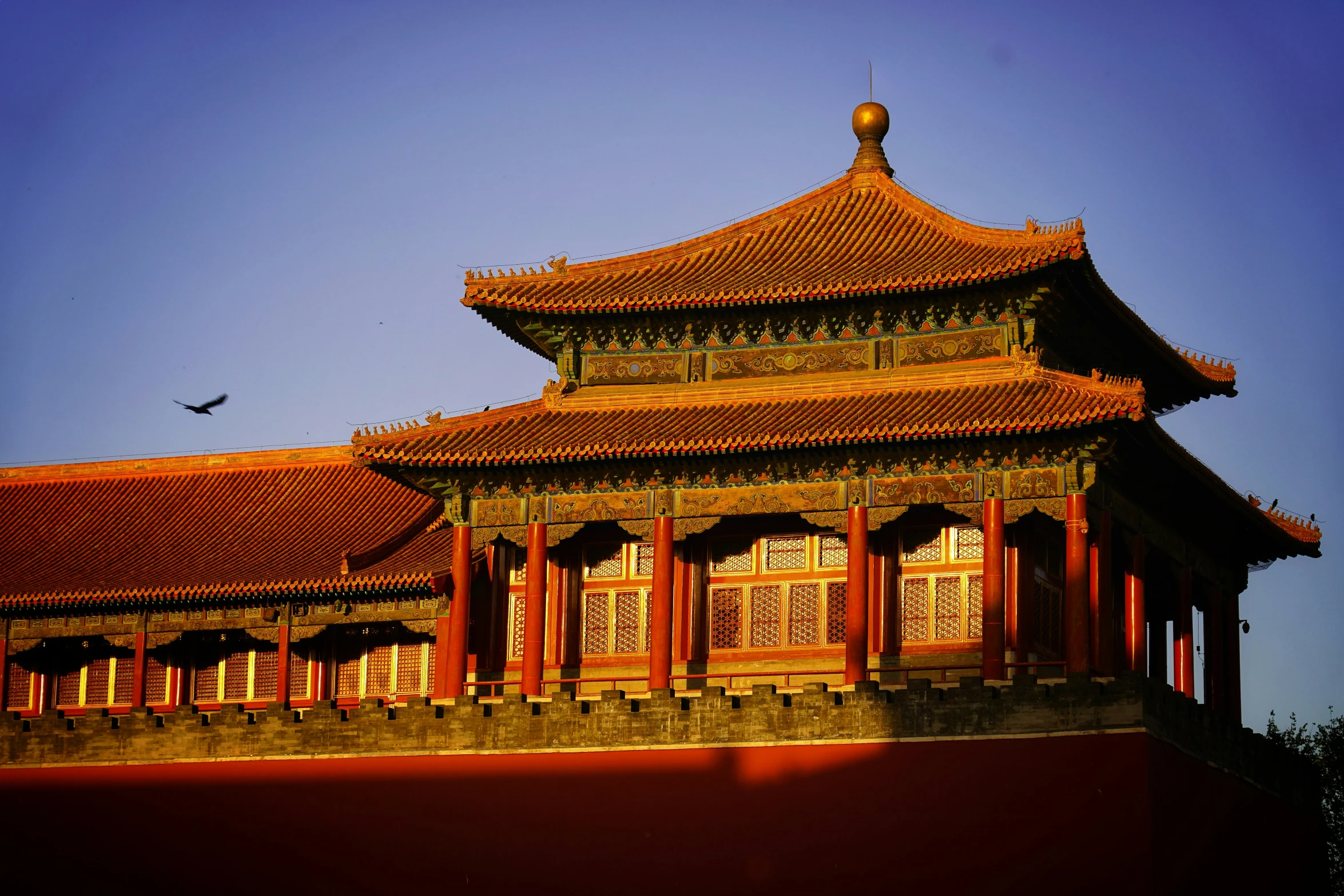 a beautiful view of the top of a red pagoda