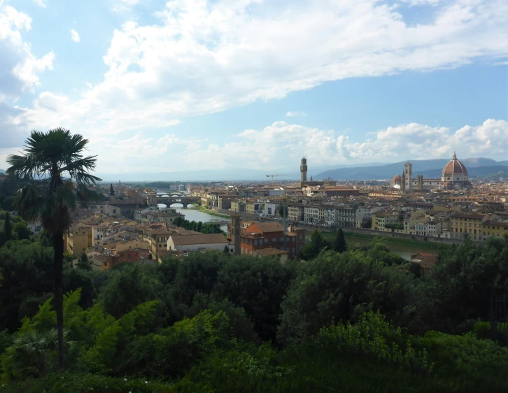 an overview view of rome with the city in the distance