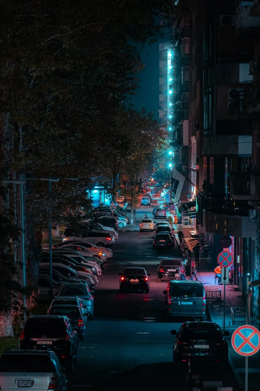 a very crowded city street with many cars