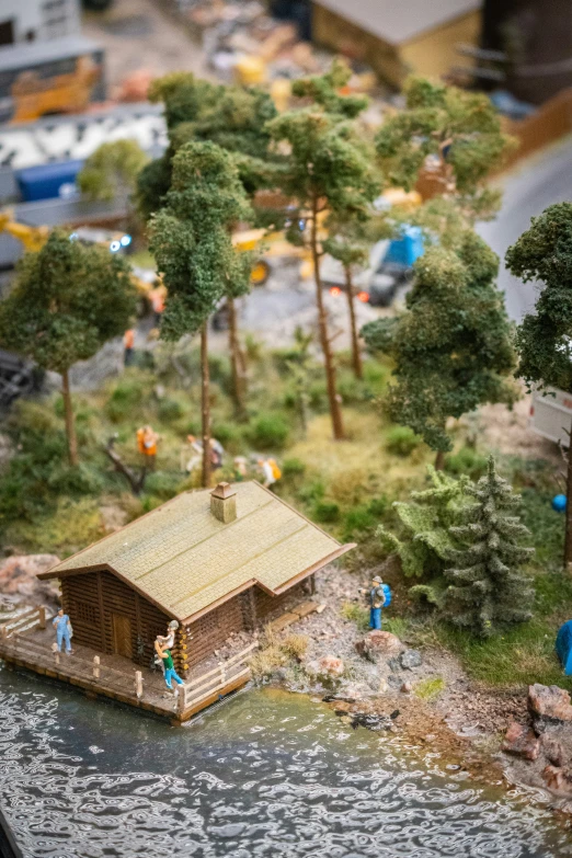 a model of an island with people by the water