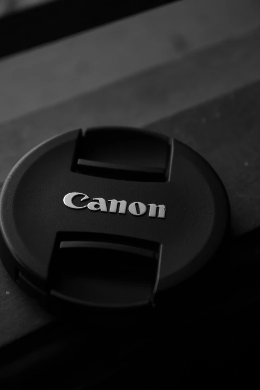 the canon logo is placed on a camera