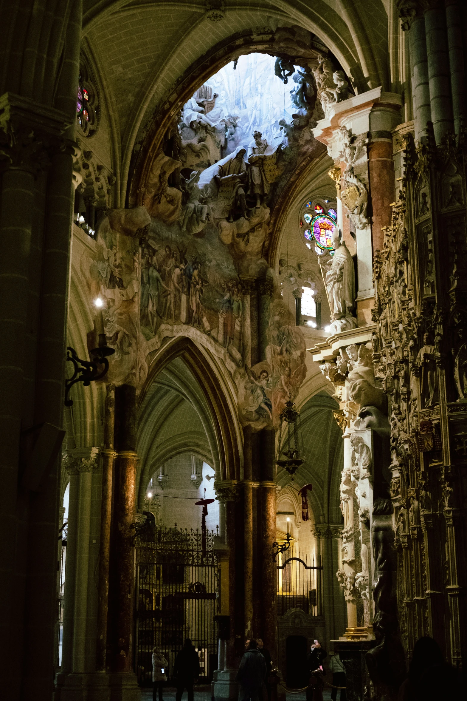 an interior of a church with stained glass windows