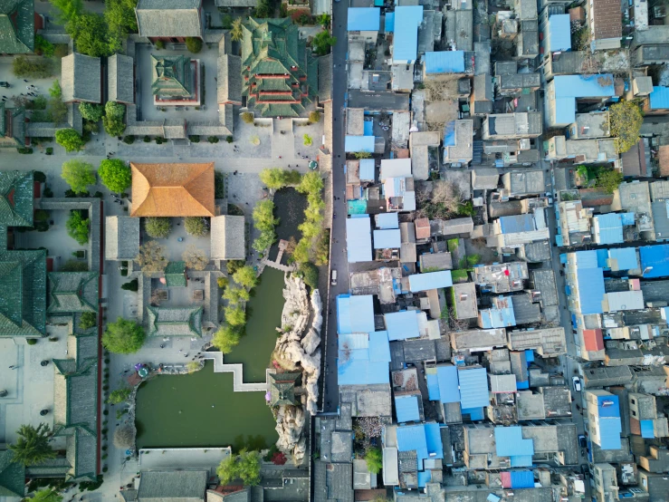 an aerial view of houses and lots of water