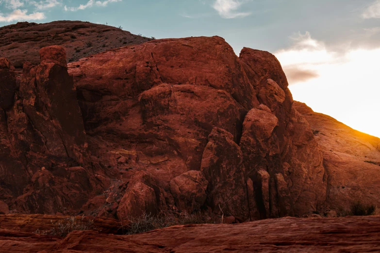 a very large rocky formation with a lot of red rocks