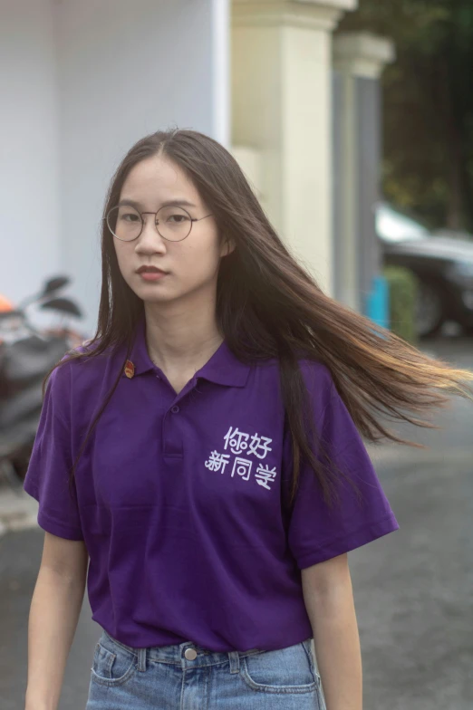 an image of a girl in a purple shirt