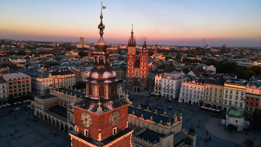 an aerial view of a large city with many buildings and a tower