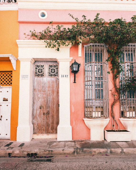 the old windows are painted orange and white