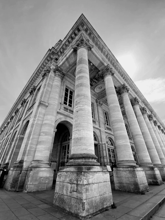 a very tall building with four large columns