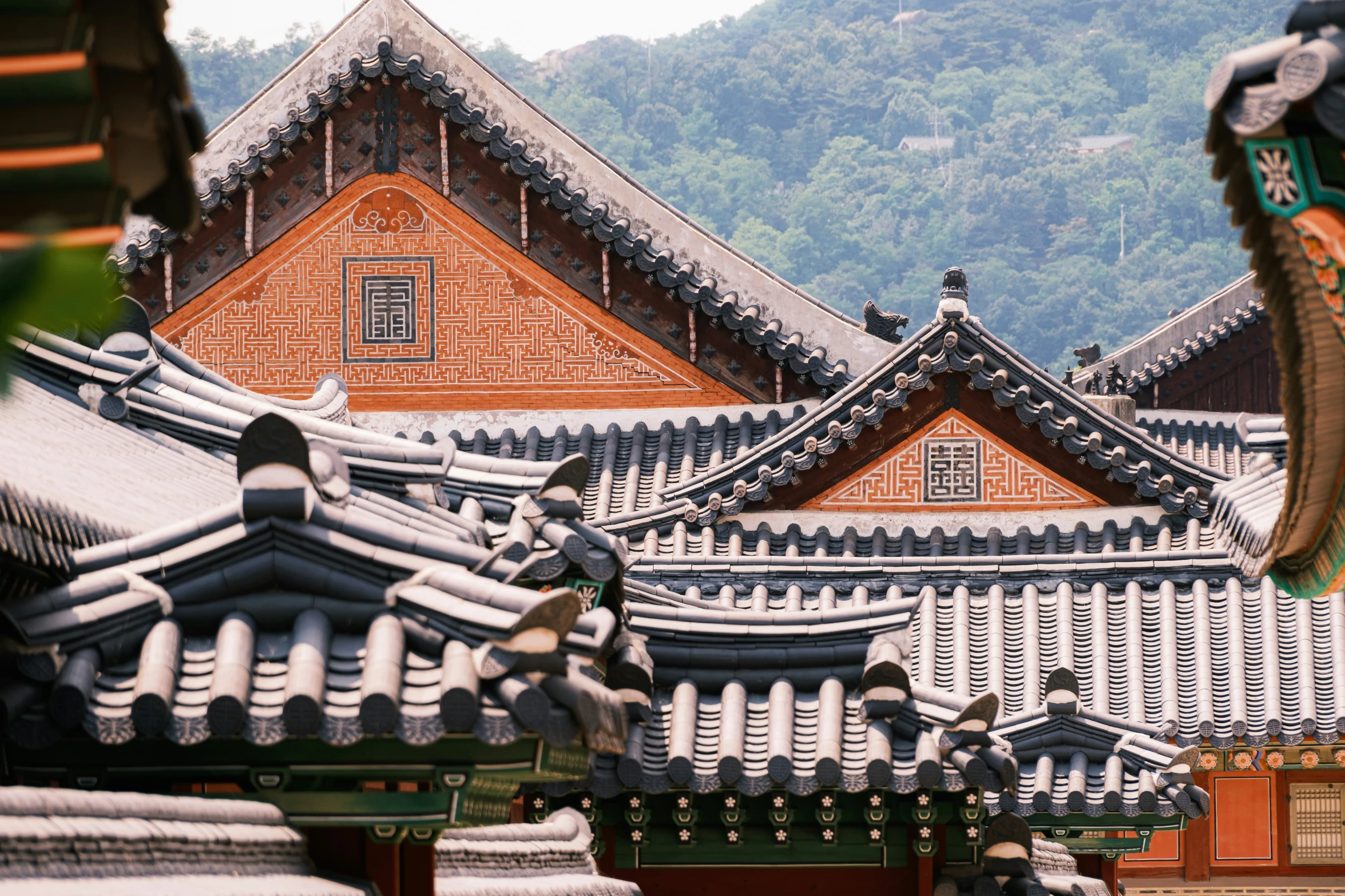 many buildings with various roofs near each other