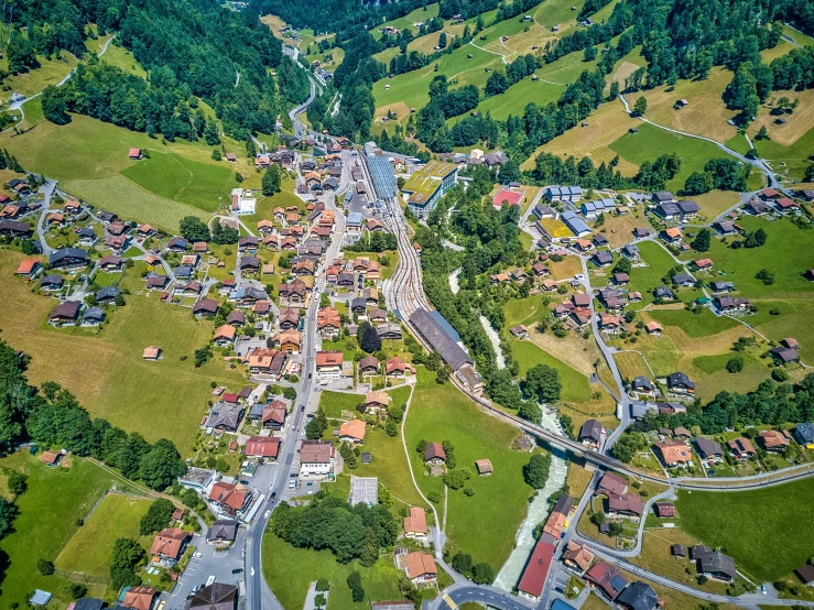 an aerial view of a city in the mountains