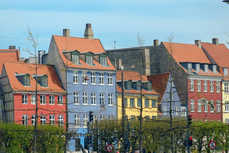 many colorful buildings line the street in an old town