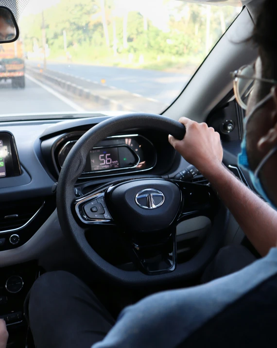 the driver is listening to music while driving