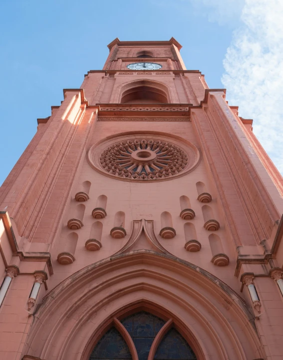 an old church has a tower and a clock