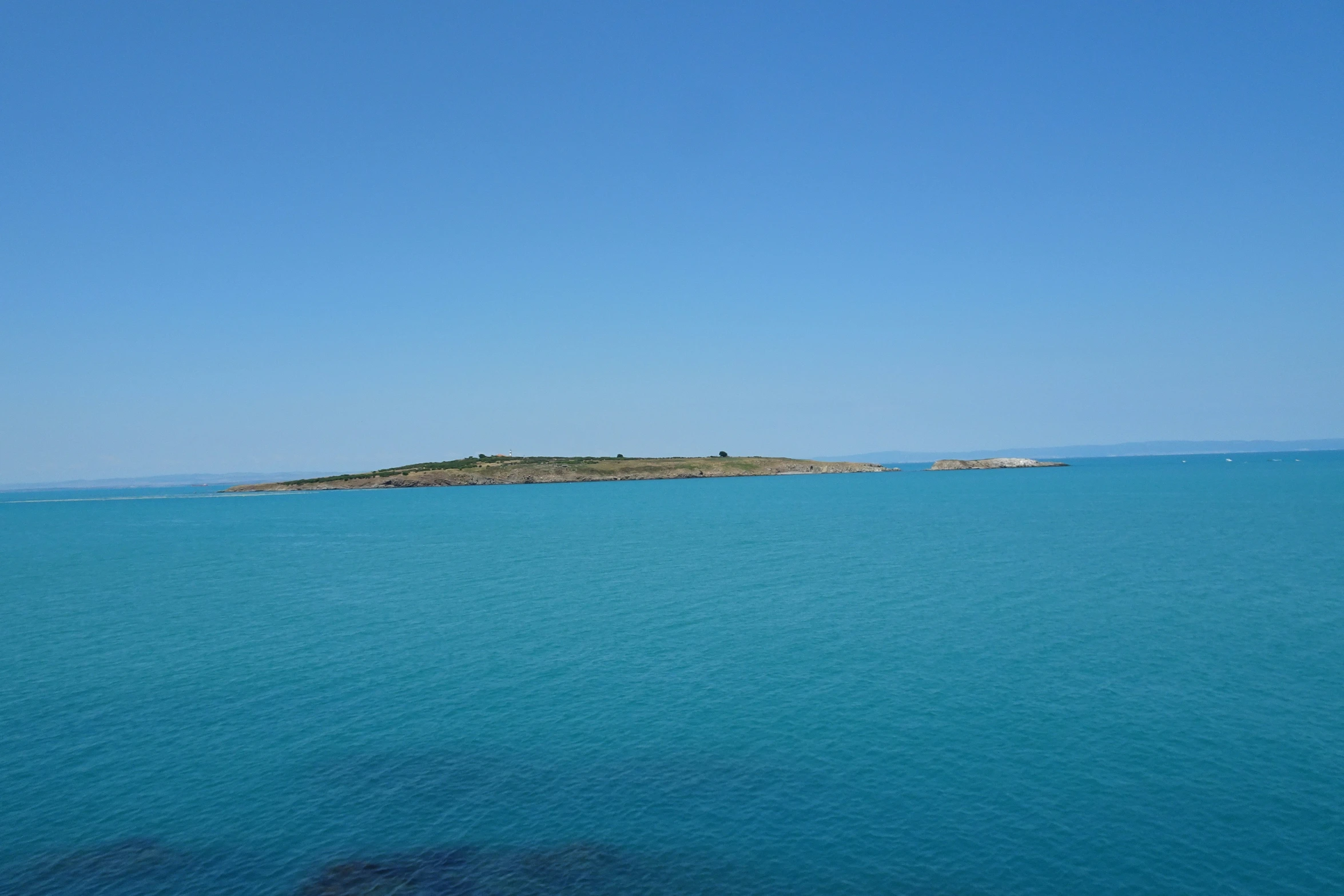 a body of water surrounded by land