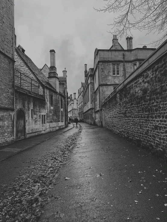 a black and white po of a wet street