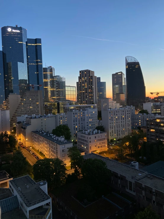 cityscape, including the skyscrs of a large city at night