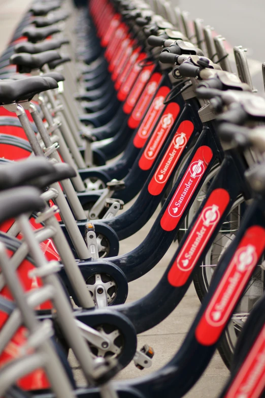 a group of bikes with many logos in a row