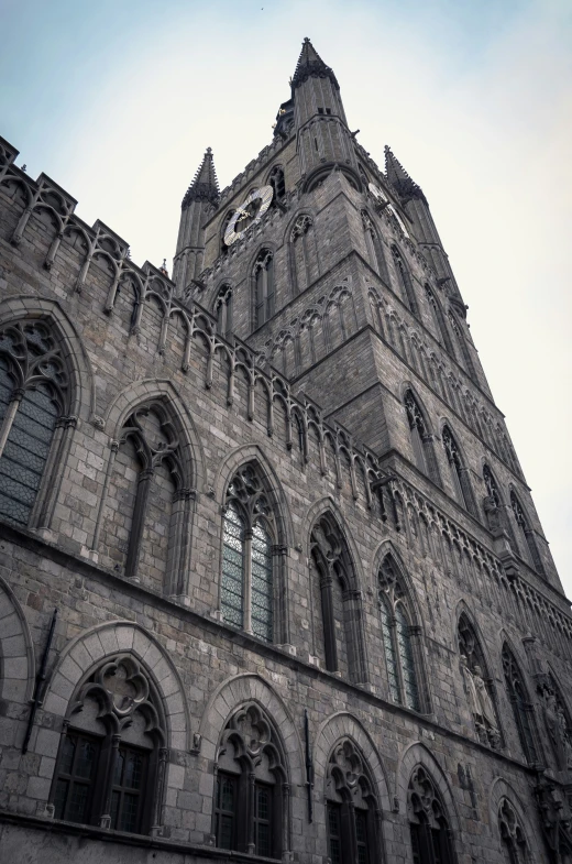 a gothic cathedral with a clock tower