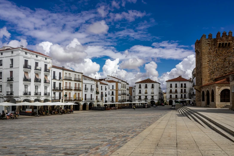 the cobblestone streets are lined with lots of buildings