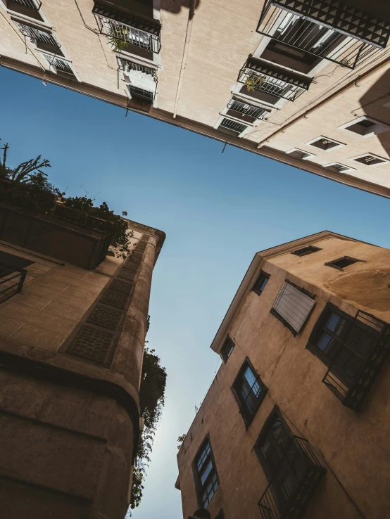 looking up at the outside of some buildings