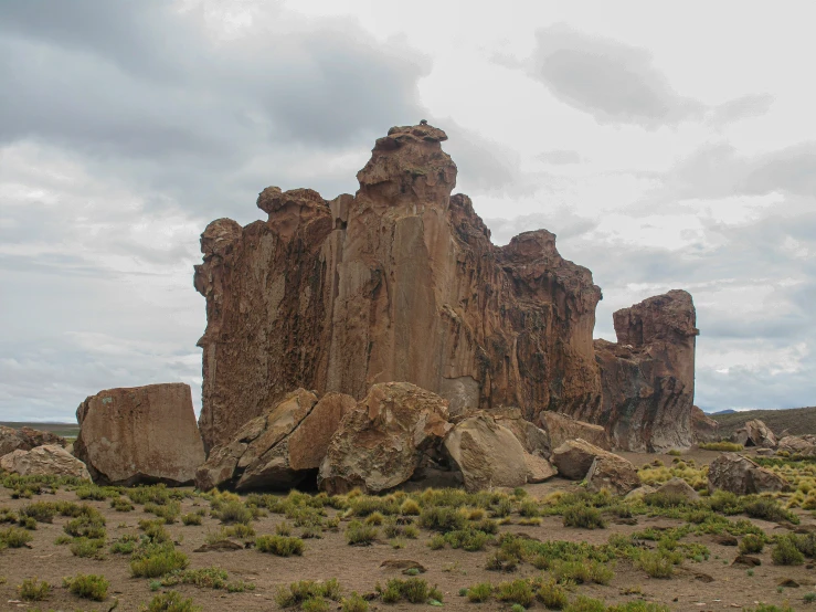 rocks are scattered across the land in a field