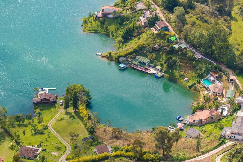 an aerial view of a waterfront city near the water