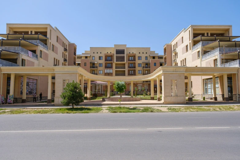 a building with balconies and multiple balconies in front