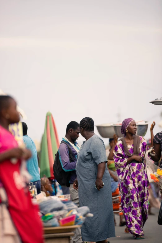 several people at a market near each other