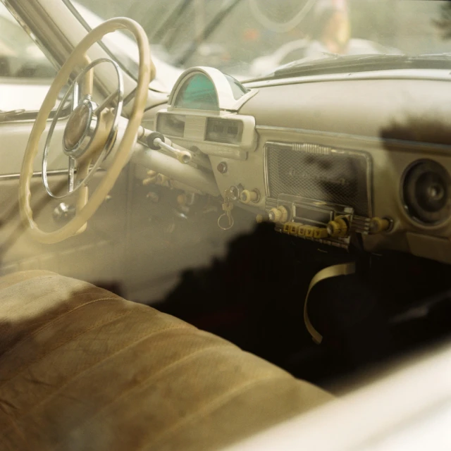 a steering wheel and radio in a car