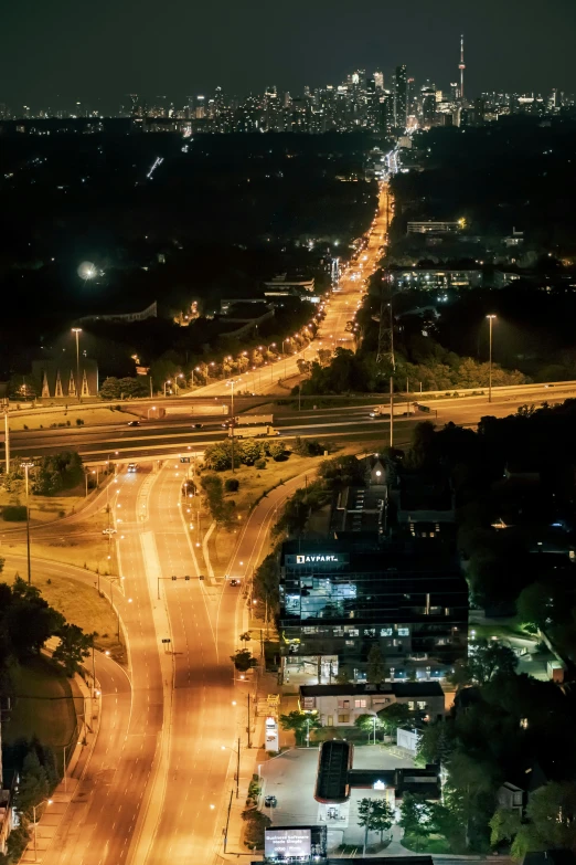 a night time s of the city lights, roads and traffic