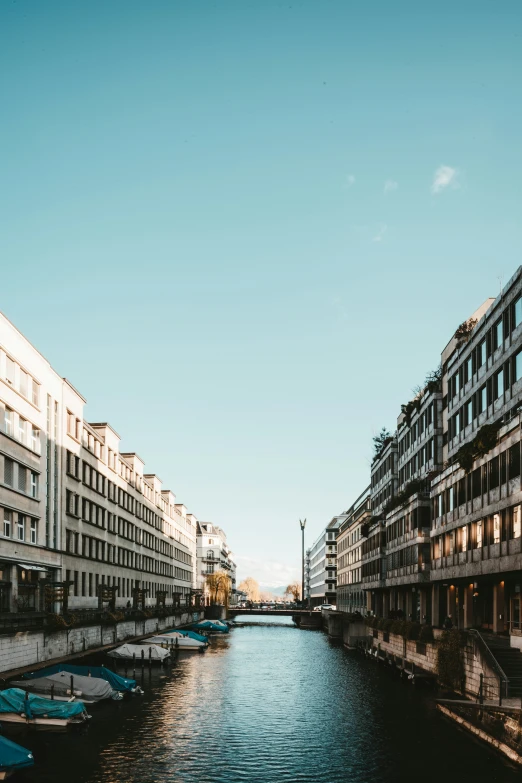 the waterway is lined with empty chairs for resting