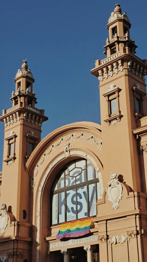 two clocks are visible at the top of an ornate building