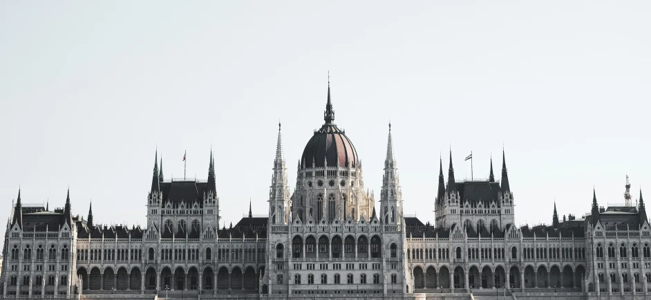 a view of a building made from stone and towers