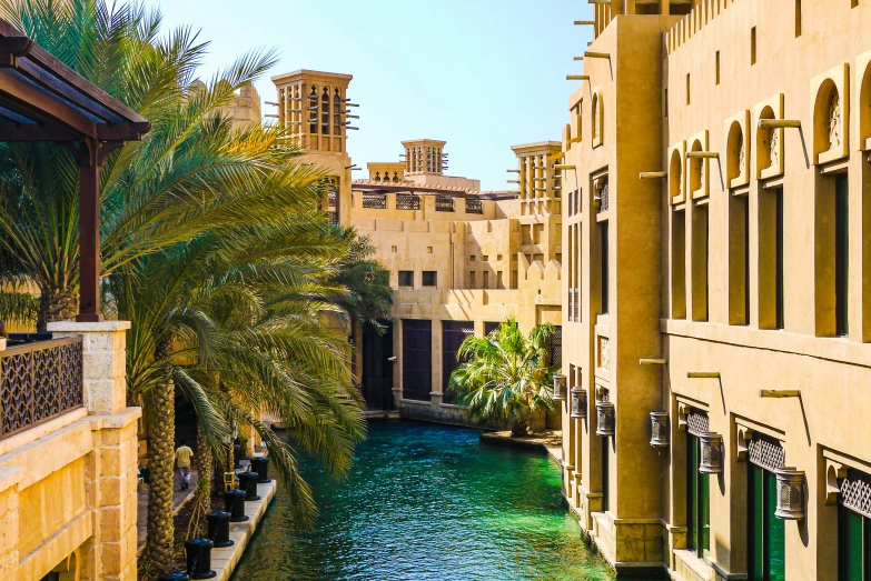 a view of a canal that runs through some buildings