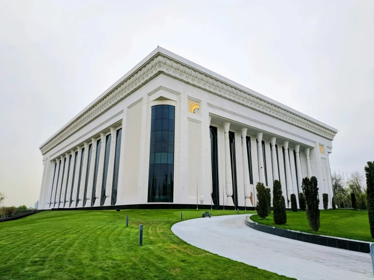 a very large white building with many windows