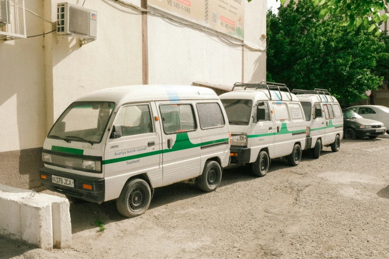 a group of vans parked next to each other