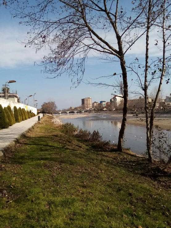 an image of a bench and a bench near a river