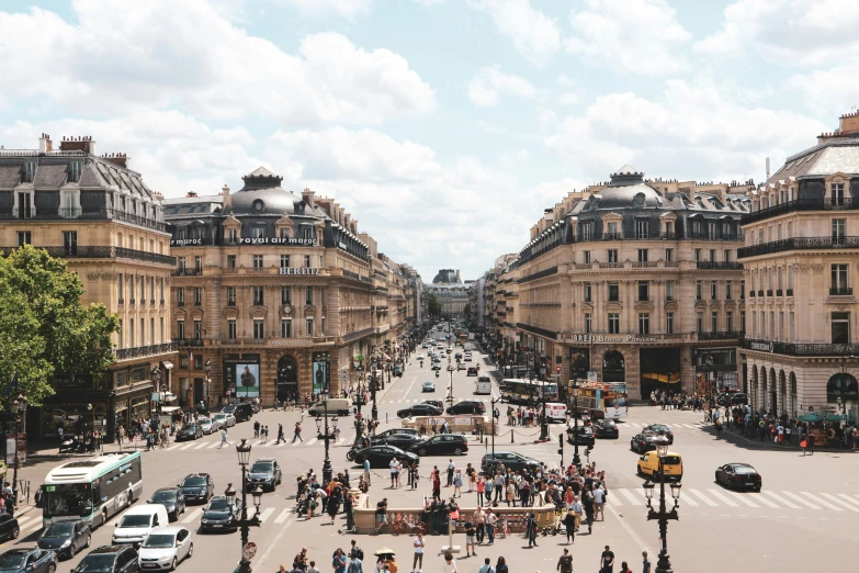 there are many people standing in the middle of the road