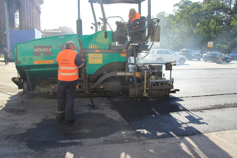 a person working on the back of a machine