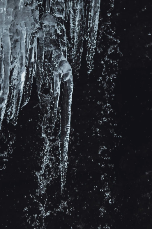 the side of a frozen mountain in deep snow