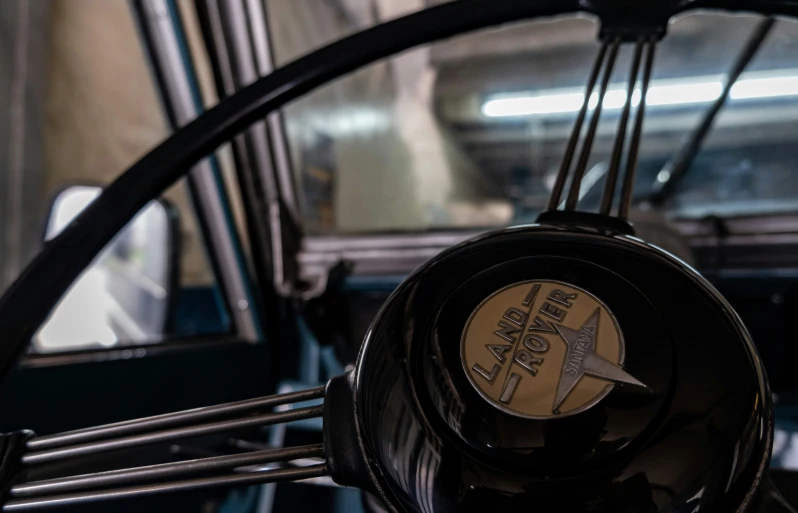 a closeup of the clock face on an old bus