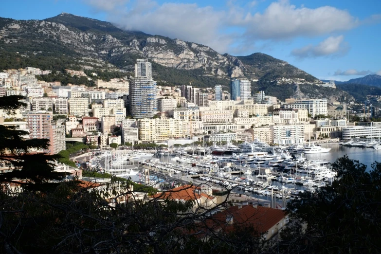 a city with buildings and some boats