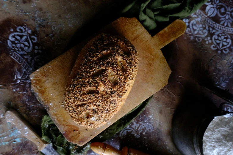 a sandwich that is on top of a  board